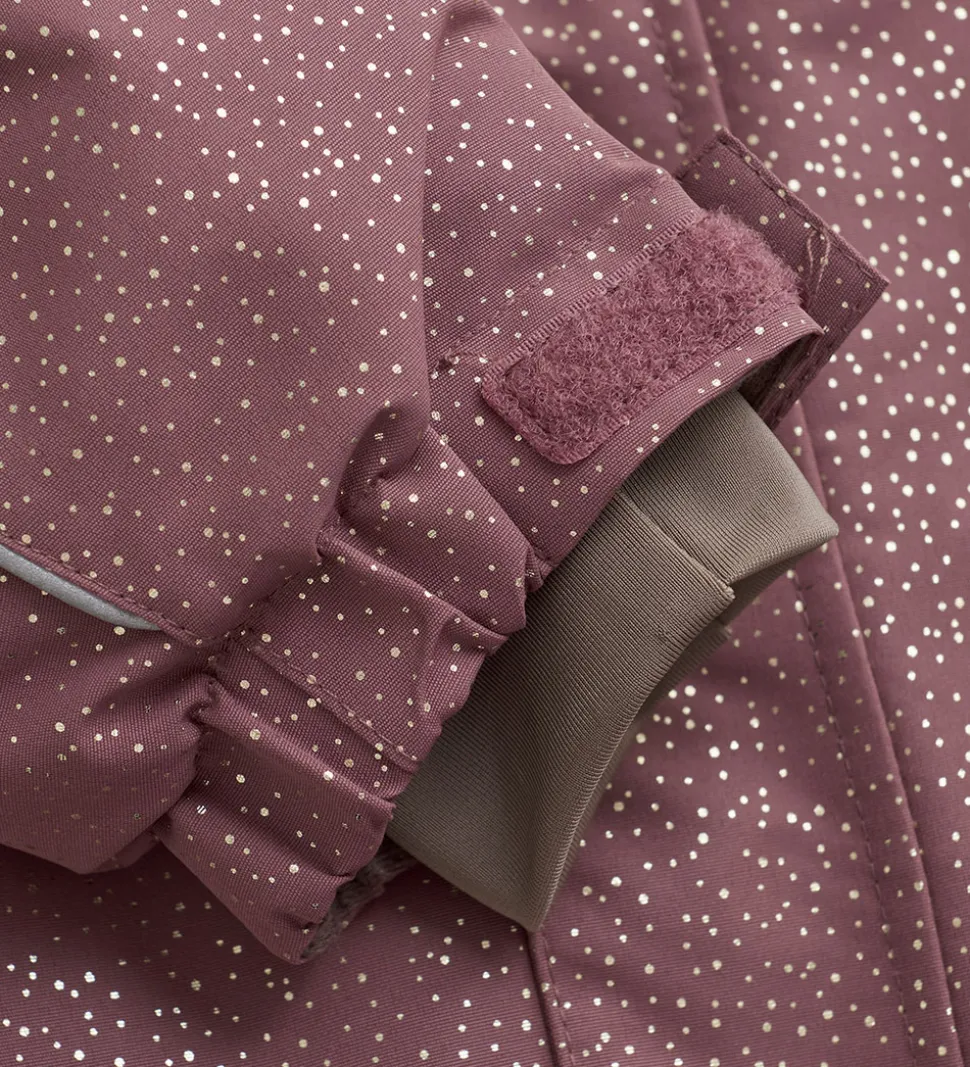 En Fant Flyverdragt - Rosa Taupe m. Guldprikker/Flæser