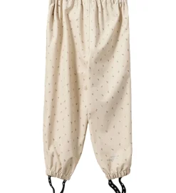 Sofie Schnoor Regntøj - PU - Varask - Sand m. Blomster