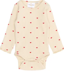 The New Siblings Body l/æ - TnsbRhea - Rib - Gardenia AOP