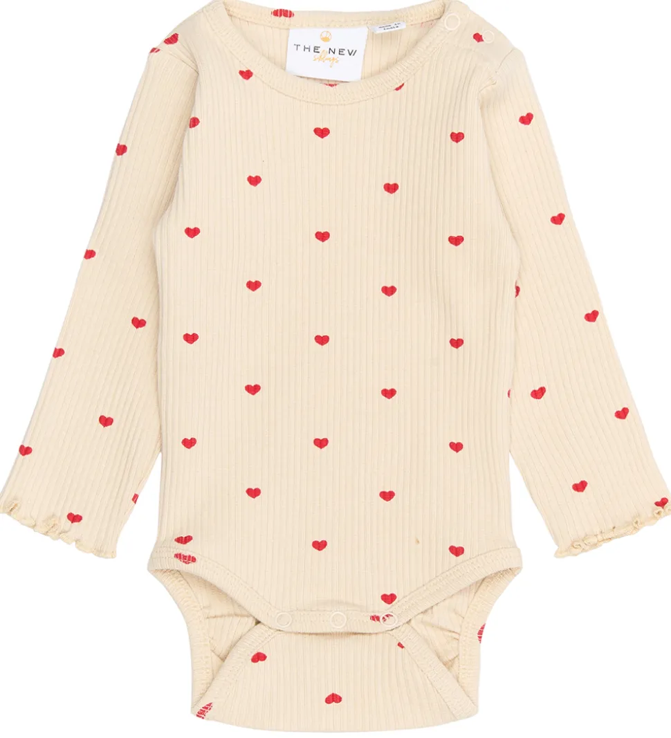 The New Siblings Body l/æ - TnsbRhea - Rib - Gardenia AOP